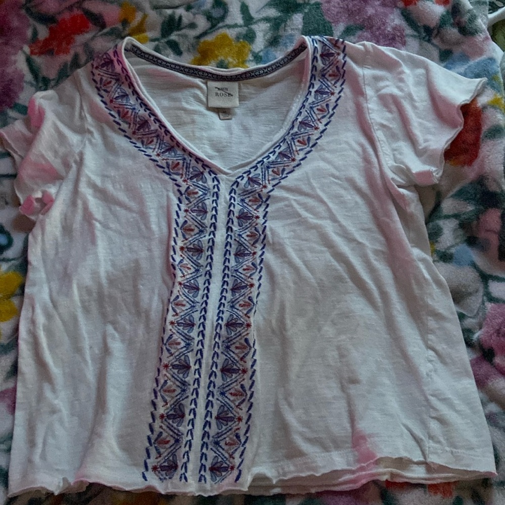 Women’s blouse white with floral pattern. Size medium.